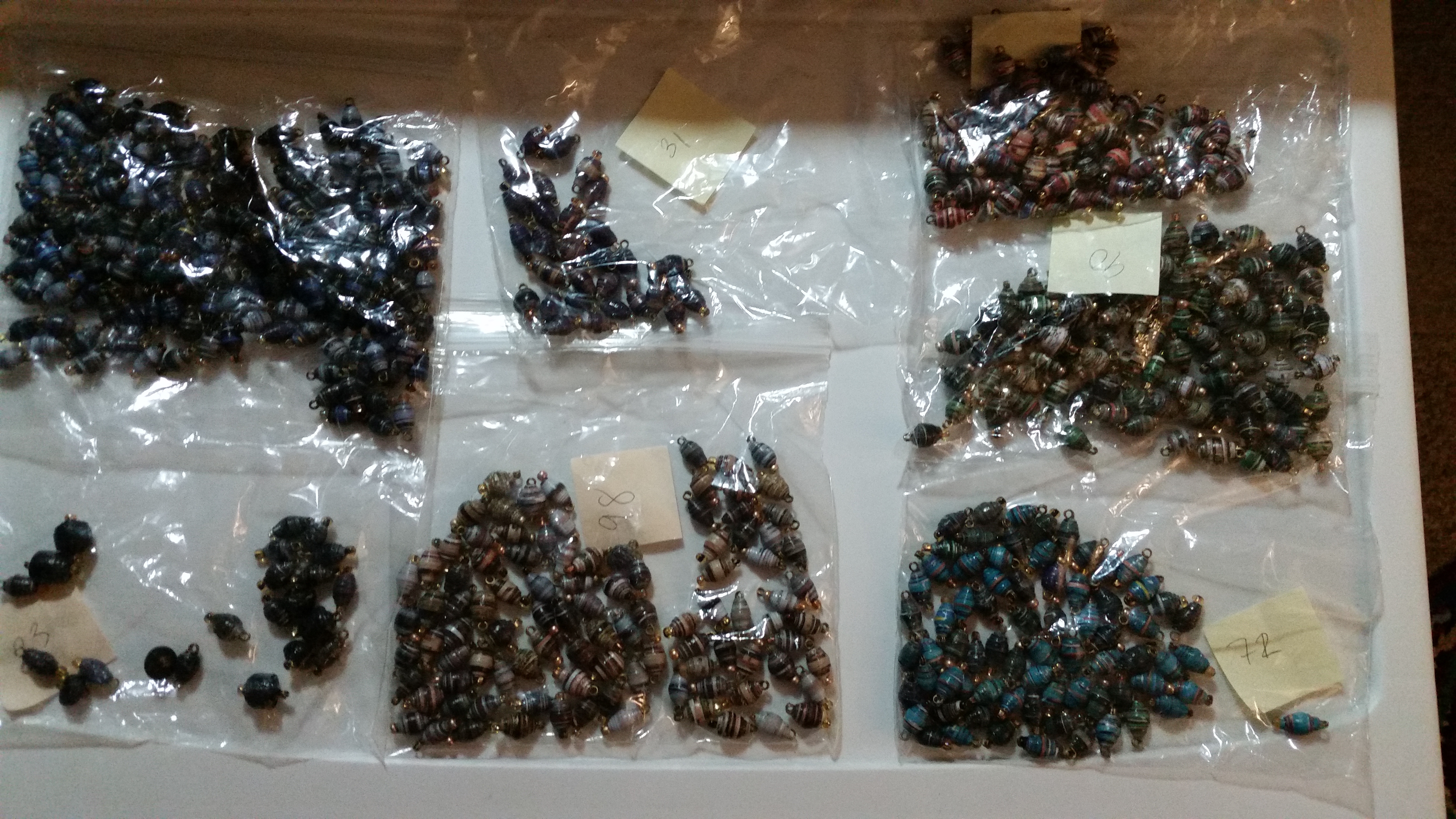 bags of paper beads